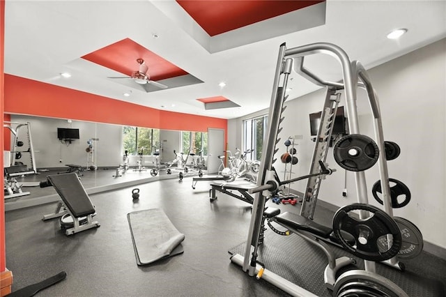 workout area featuring plenty of natural light and ceiling fan