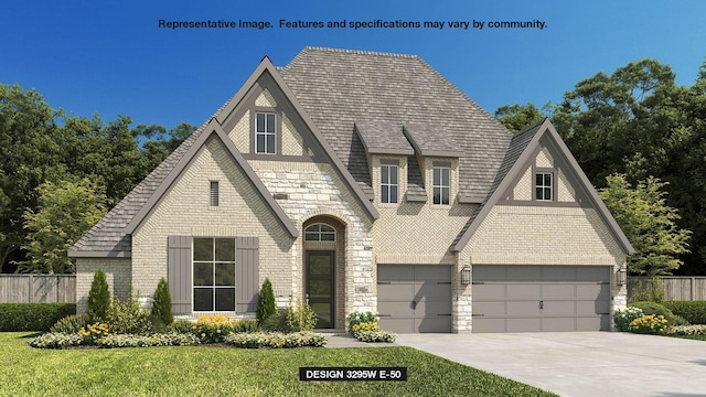 view of front facade featuring a garage and a front lawn