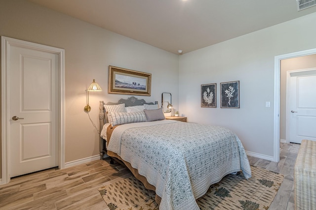 bedroom featuring light hardwood / wood-style flooring