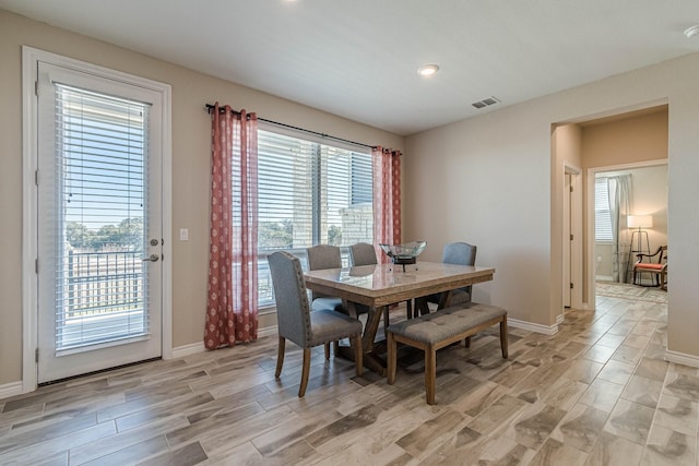 dining room with light hardwood / wood-style flooring