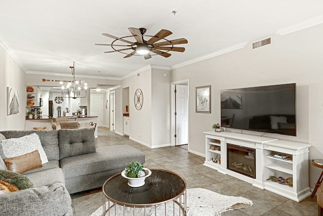 tiled living room featuring crown molding and ceiling fan with notable chandelier