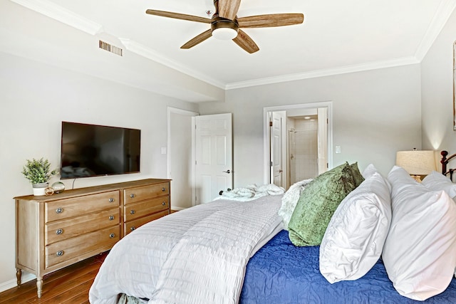 bedroom featuring dark hardwood / wood-style flooring, crown molding, and ceiling fan