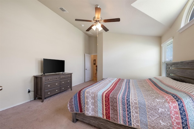 carpeted bedroom with lofted ceiling and ceiling fan