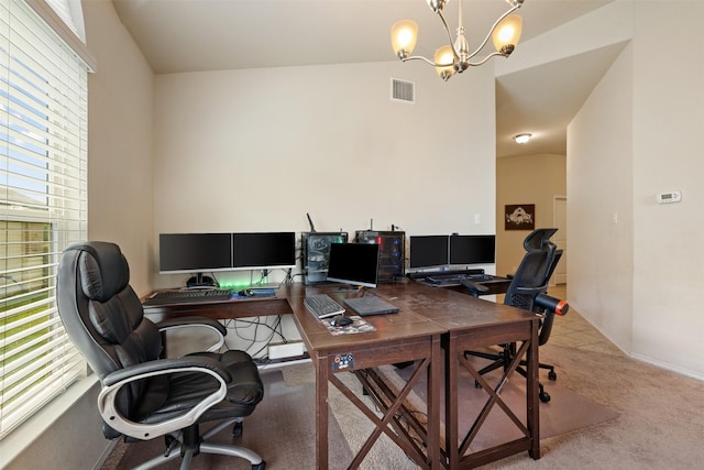 home office with light carpet, plenty of natural light, a chandelier, and vaulted ceiling