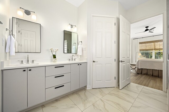 bathroom featuring vanity and ceiling fan