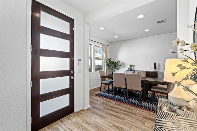 entrance foyer featuring light hardwood / wood-style floors