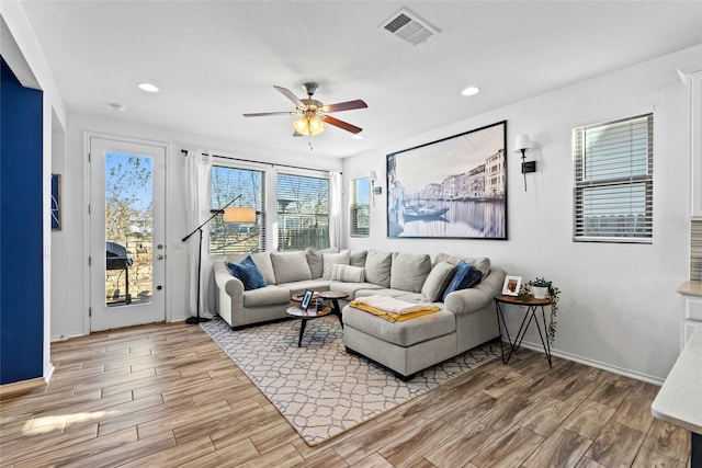 living room with ceiling fan