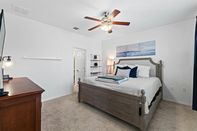 bedroom featuring ceiling fan and light colored carpet