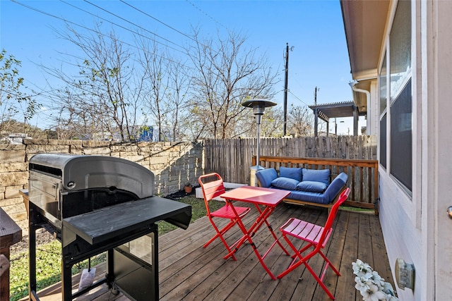 wooden deck with outdoor lounge area