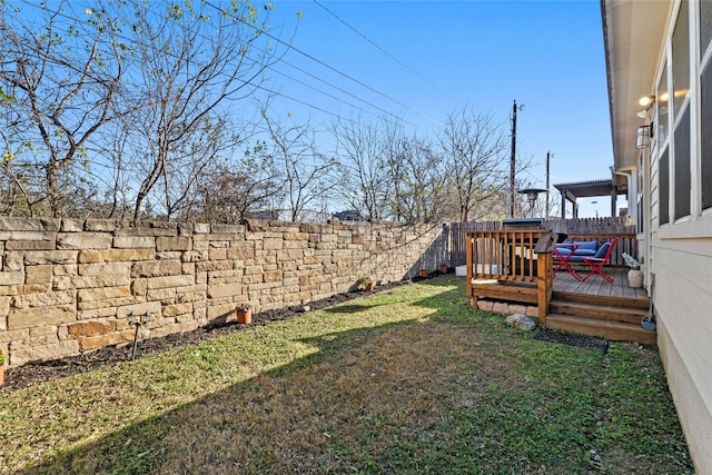 view of yard with a deck