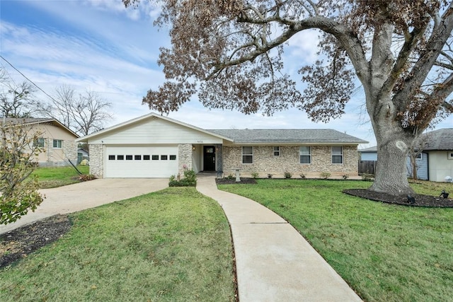 ranch-style home with a garage and a front yard