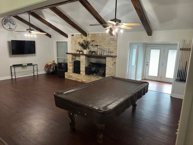 game room with dark wood-type flooring, vaulted ceiling with beams, pool table, ceiling fan, and a fireplace