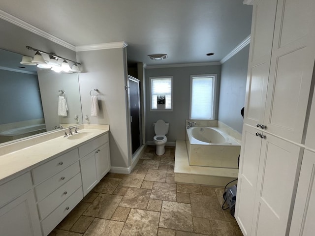 full bathroom featuring crown molding, vanity, toilet, and independent shower and bath