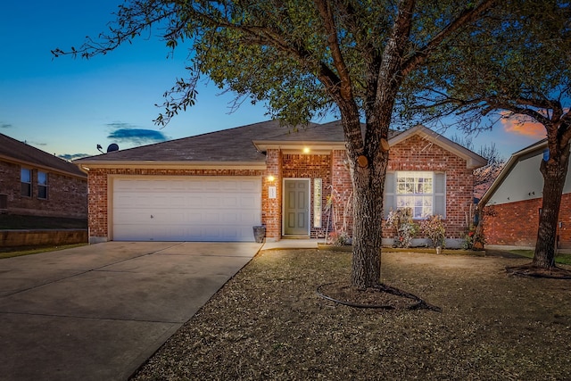 ranch-style home with a garage