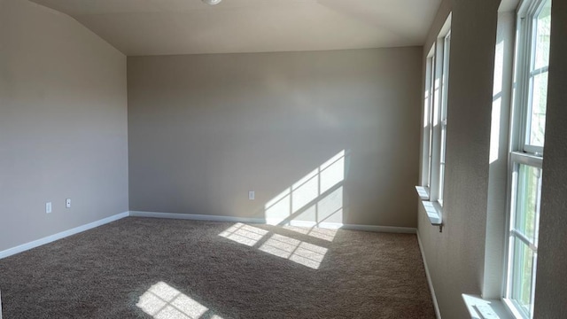 empty room featuring carpet flooring