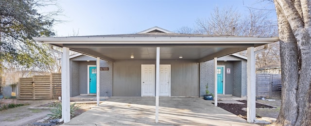 view of front of home featuring a carport