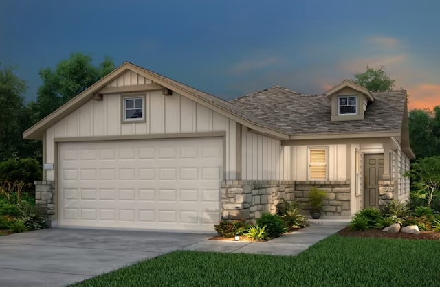 view of front of property with a garage