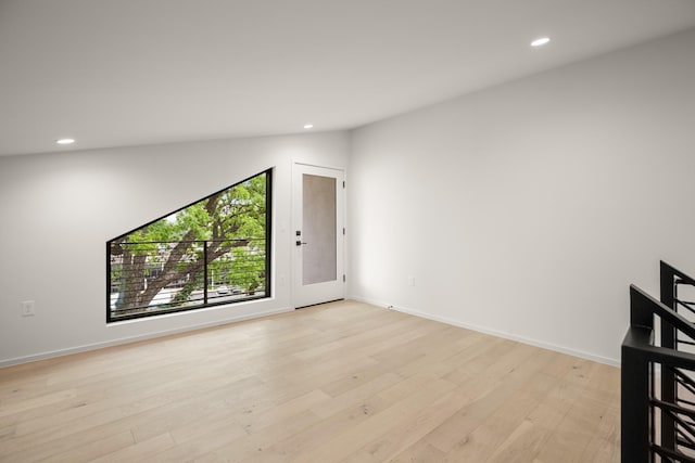 spare room featuring light hardwood / wood-style floors