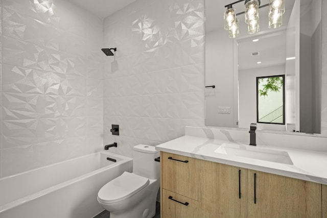 full bathroom featuring vanity, bathtub / shower combination, tile walls, and toilet