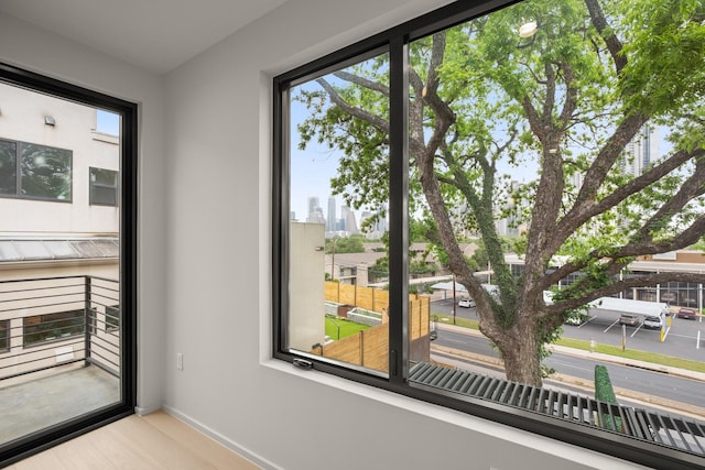 interior space with a healthy amount of sunlight and light hardwood / wood-style floors