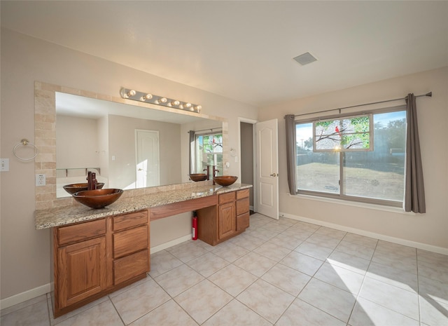 bathroom with vanity and tile patterned floors