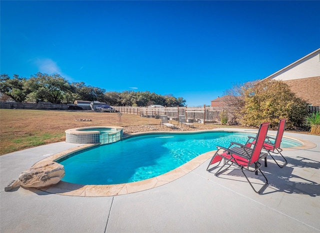 view of swimming pool featuring an in ground hot tub and a patio