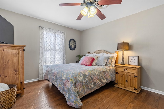 bedroom with dark wood-type flooring and ceiling fan