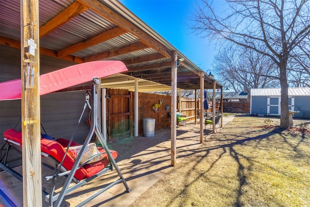 view of patio / terrace with a storage unit