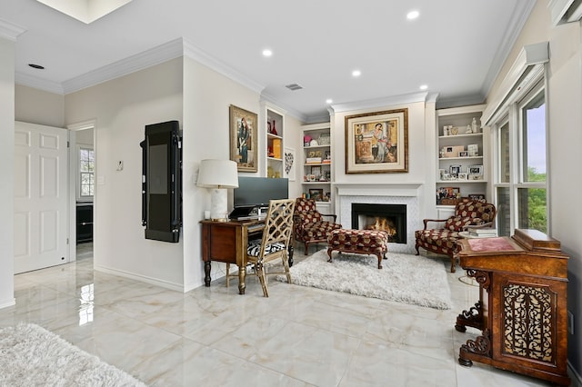 living area with built in shelves and ornamental molding