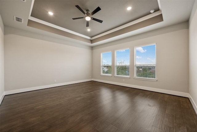 5801 Davenport Divide Rd, Austin, TX 78738 - empty room featuring a raised ceiling, a ceiling fan, dark wood-type flooring, and recessed lighting
