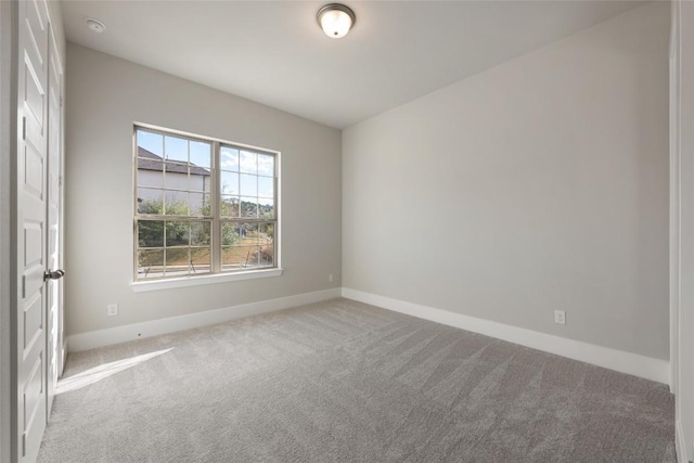 5801 Davenport Divide Rd, Austin, TX 78738 - spare room featuring carpet flooring and baseboards