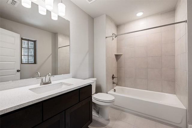 5801 Davenport Divide Rd, Austin, TX 78738 - bathroom featuring tile patterned floors, toilet, vanity, and bathtub / shower combination