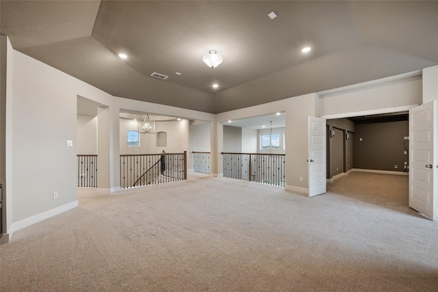 5801 Davenport Divide Rd, Austin, TX 78738 - carpeted empty room with a chandelier and recessed lighting