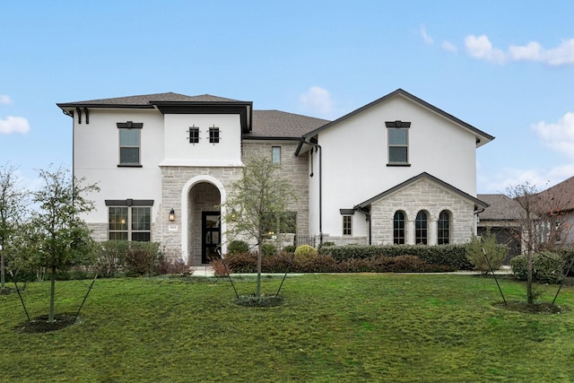 view of front of house with a front lawn