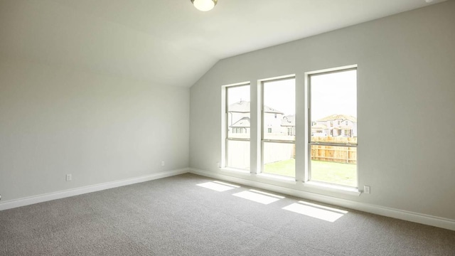 128 La Venta Loop, Liberty Hill, TX 78642 - additional living space featuring healthy amount of natural light, carpet, and lofted ceiling