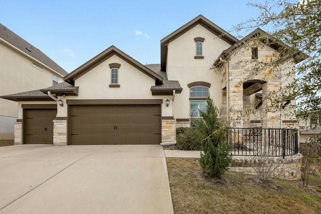 view of front of home with a garage