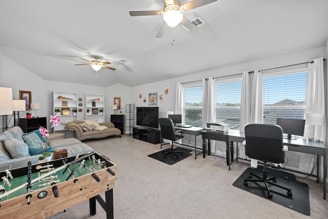 interior space with light carpet, vaulted ceiling, and ceiling fan