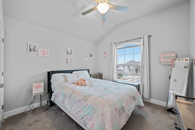 carpeted bedroom featuring ceiling fan and vaulted ceiling