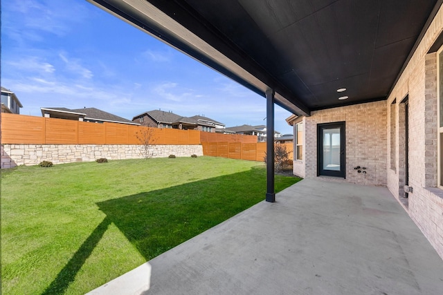 view of yard with a patio area