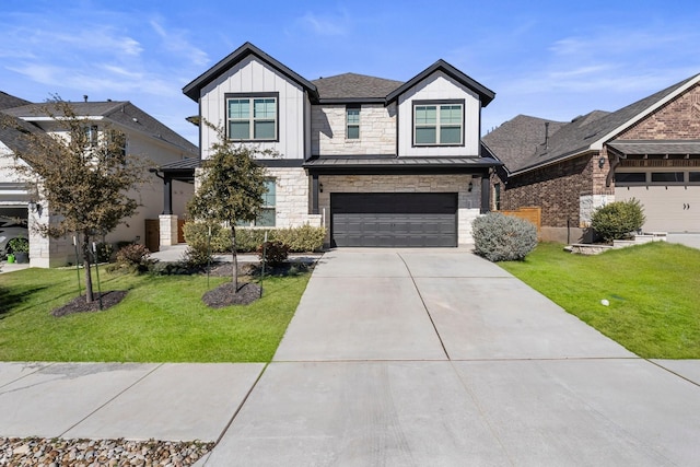 view of front of property with a garage and a front lawn