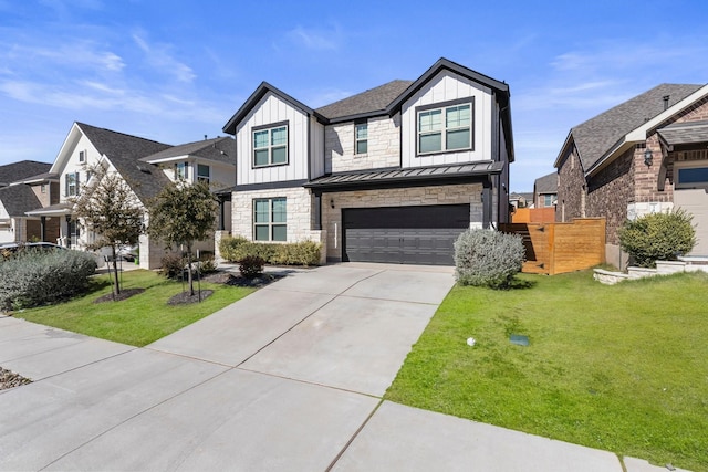 view of front of property featuring a garage and a front lawn