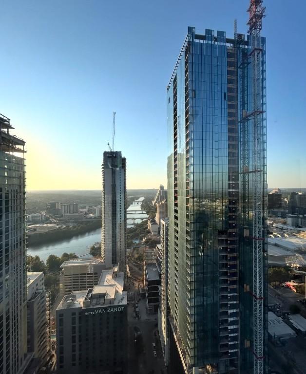 property's view of city with a water view