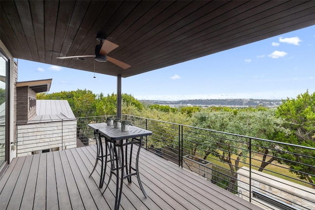 wooden deck with ceiling fan