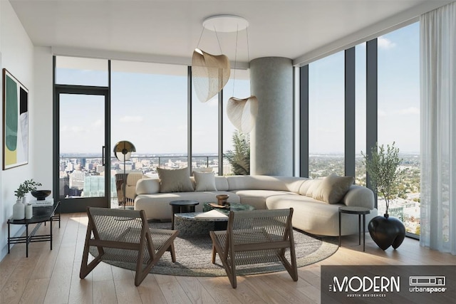 610 Davis St Unit 3105, Austin, TX 78701 - living room featuring a wall of windows, healthy amount of natural light, and light wood-style flooring
