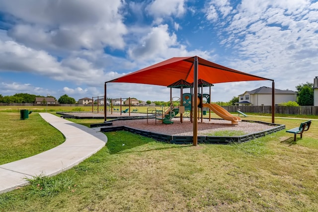 view of playground with a yard