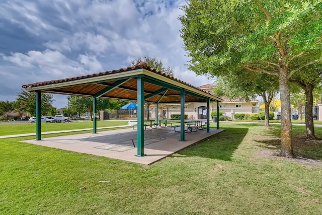 surrounding community featuring a gazebo and a yard