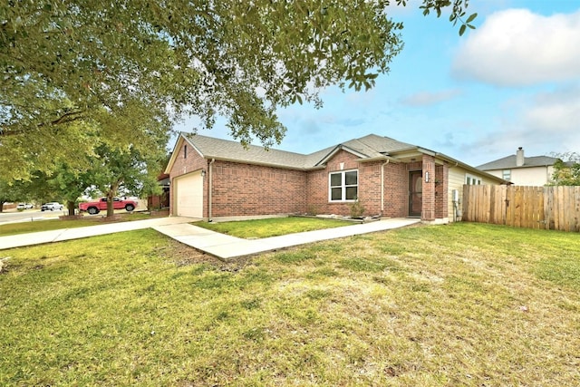 ranch-style house with a garage and a front lawn