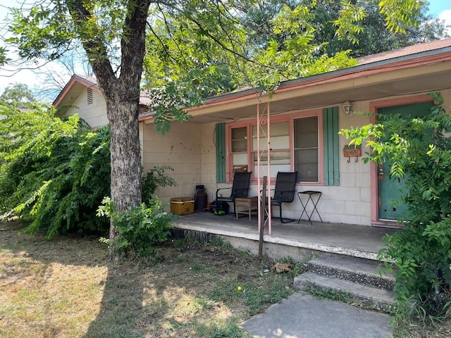 property entrance with a porch