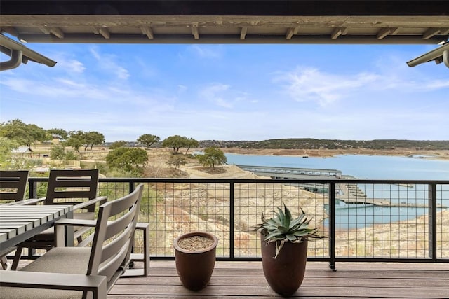 deck featuring a water view