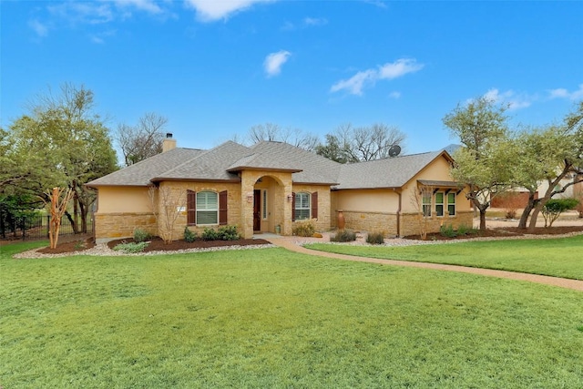 view of front of house with a pergola and a front lawn